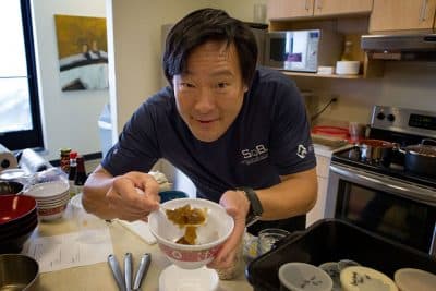 Chef Ming Tsai pauses from his soup preparation in the WBUR kitchen. (WBUR / Robin Lubbock)