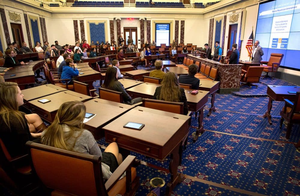 Quincy High School students participating in a mock Senate session at the Edward M. Kennedy Institute debate an amendment to an immigration reform bill. (Robin Lubbock/WBUR)
