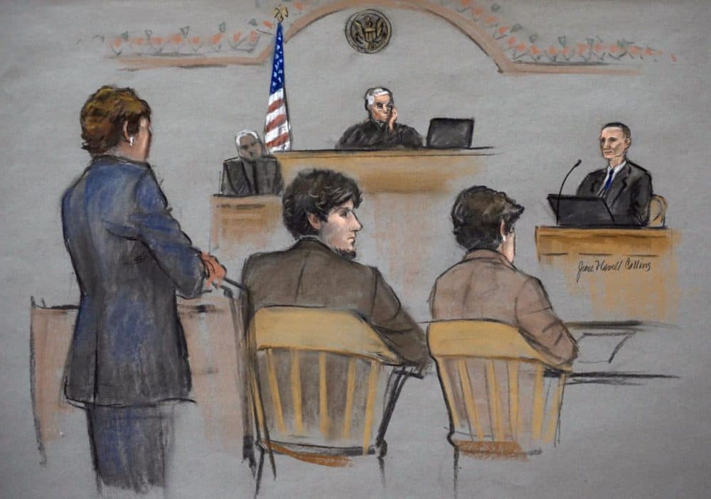 In this courtroom sketch, Bill Richard, right, whose son was killed in the Boston Marathon bombing, testifies during the federal death penalty trial of Dzhokhar Tsarnaev, second from left. (Jane Flavell Collins/AP)