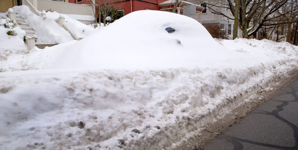 That a car under there? A car is buried in snow on Upland Road in Cambridge on Feb. 7. (Robin Lubbock/WBUR)