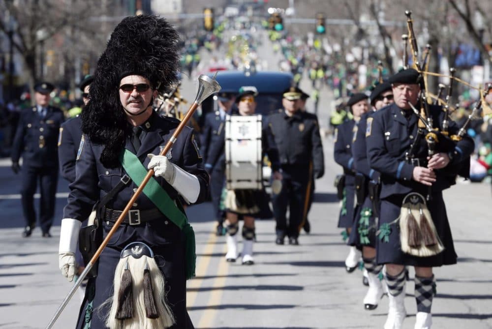 The Boston Police Gaelic Column marches in the annual South Boston St. Patrick's Day parade in 2014. This year, the parade will include, for the first time, two gay groups. (Michael Dwyer/AP)
