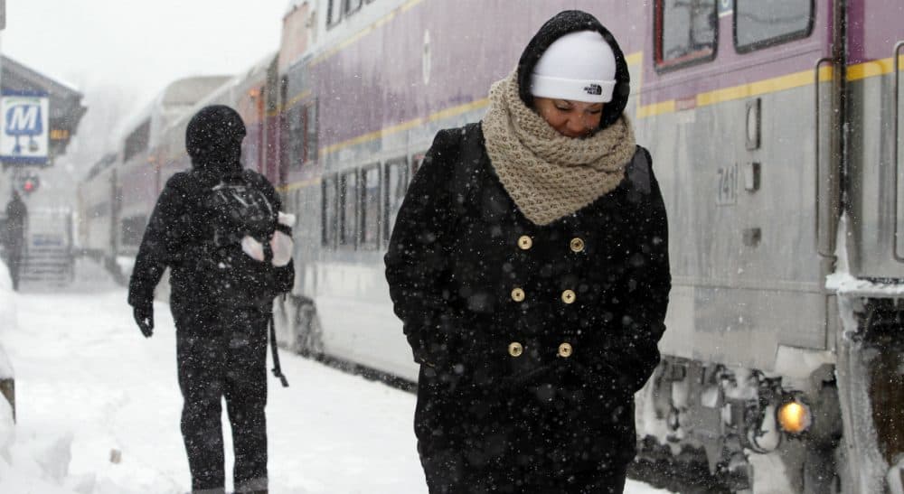 After the winter we've had, there's no time like the present to fix the state's transportation woes. In this photo, passengers wait at the commuter rail train station Monday, Feb. 9, 2015, in Framingham, Mass. (Bill Sikes/AP)