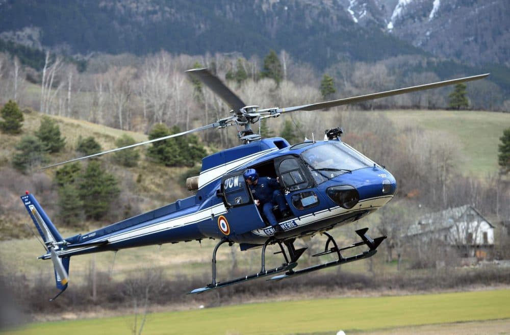 An Aerospatiale AS350 Ecureuil helicopter of the French National Gendarmerie is seen in Seyne, south-eastern France, on March 24, 2015, near the site where a Germanwings Airbus A320 crashed in the French Alps. (Anne-Christein Poujoulat /AFP/Getty Images)