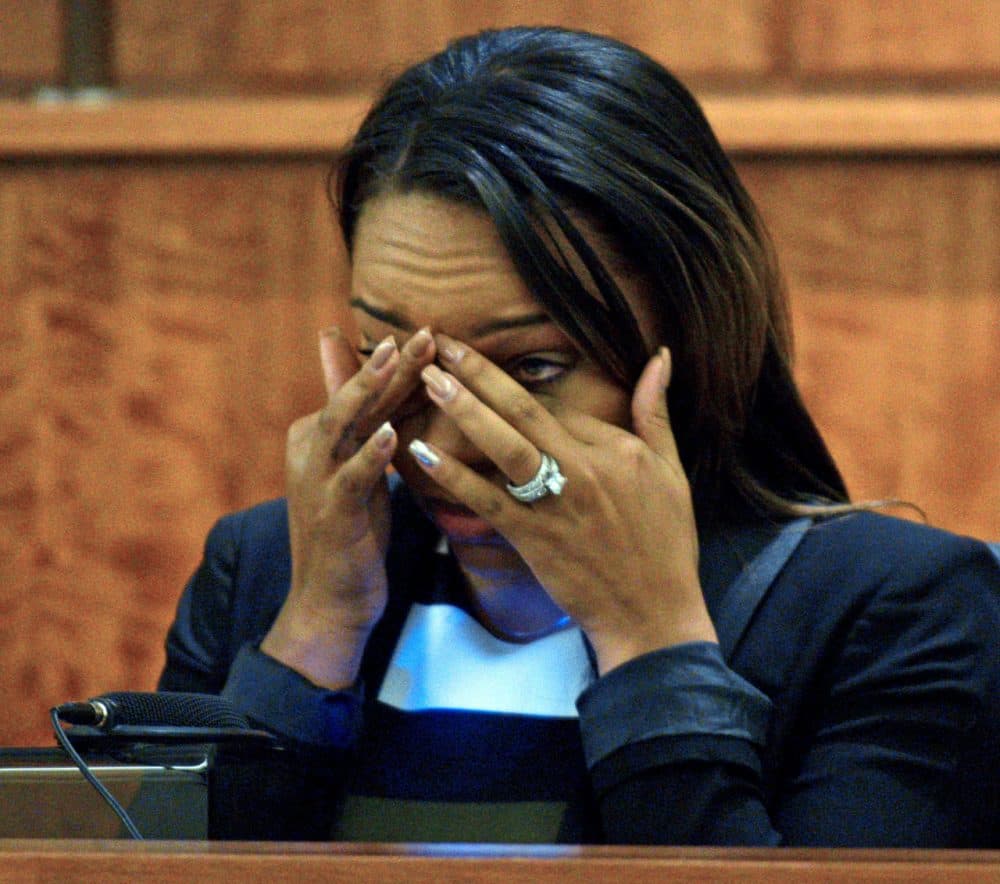 Shayanna Jenkins, the fiancee of former NFL football player Aaron Hernandez, cried as she testified in court during his murder trial Monday. (Ted Fitzgerald/Boston Herald/Pool)