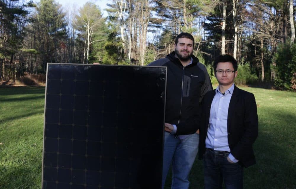 Two of the founders of CloudSolar, Cory Absi, left, and Michael Sun, right, stand by a solar panel. (Courtesy CloudSolar)
