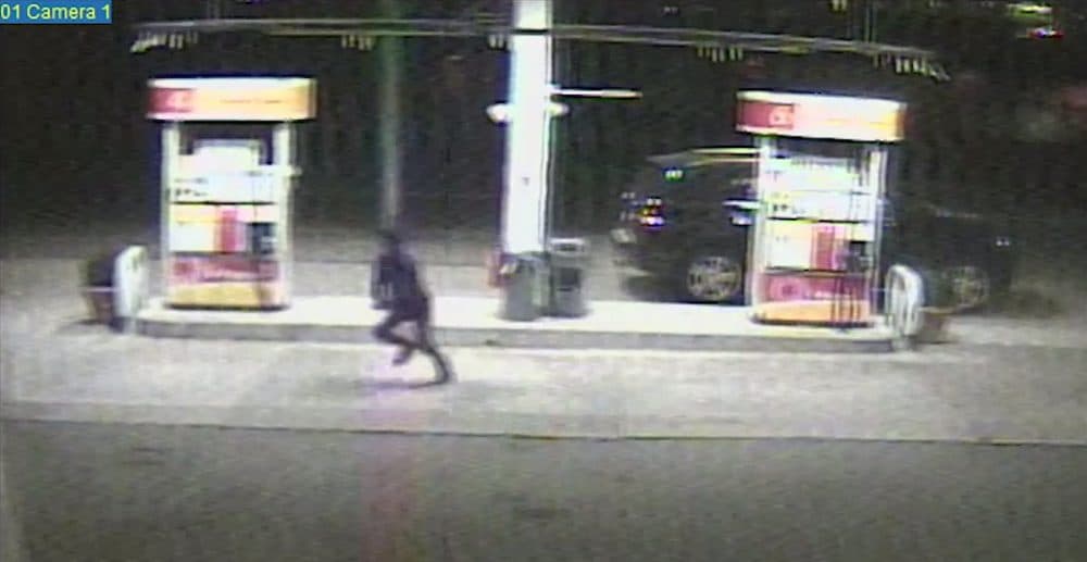 Dun Meng decided to make his escape after Tamerlan Tsarnaev pulled into a gas station and Dzhokhar Tsarnaev went inside to pay. Here he is pictured running from his car. (Department of Justice)