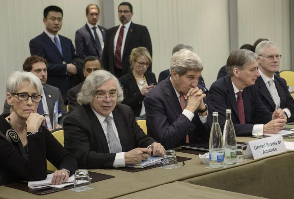 U.S. Secretary of State John Kerry, center, and British Foreign Secretary Philip Hammond, second right, waits with U.S. Under Secretary for Political Affairs Wendy Sherman, left, U.S. Secretary of Energy Ernest Moniz, second left, and others before a meeting Lausanne, Switzerland Monday, March 30, 2015, during Iran nuclear talks. (Brendan Smialowski/AP)