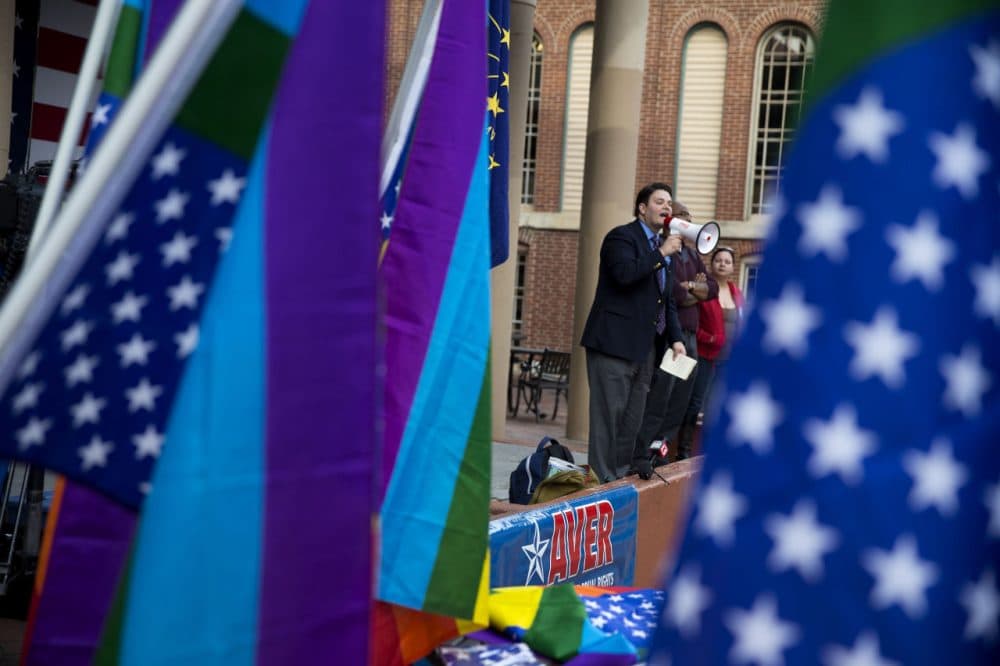 Demonstrator JD Ford speaks outside the City County Building on March 30, 2015 in Indianapolis, Indiana. The group called on the state house to roll back the controversial Religious Freedom Restoration Act, which critics say can be used to discriminate against gays and lesbians. (Aaron P. Bernstein/Getty Images)