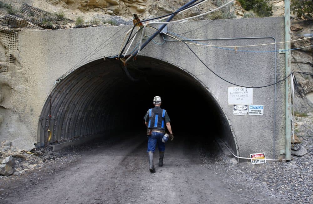 A miner enters an auxiliary entrance at the Sufco Coal Mine, 30 miles east of Salina, Utah on May 28, 2014. (George Frey/Getty Images)