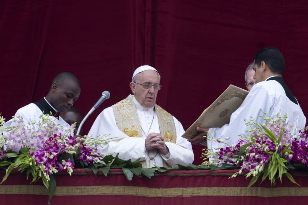 Pope Francis speaks before delivering the Urbi et Orbi (to the city and to the world) blessing at the end of the Easter Sunday Mass in St. Peter's Square at the Vatican , Sunday, April 5, 2015. (AP Photo/Andrew Medichini)