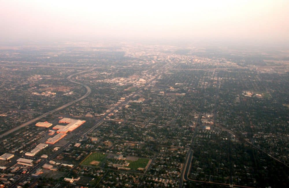 Fresno, California, is pictured from a plane window in 2008, hazy due to wildfires. (purpletwinkie/Flickr)