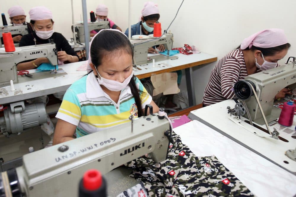 Cambodian women work at a garment factory in Phnom Penh, on August 24, 2007. (Tang Chhin Sothy/AFP/Getty Images)