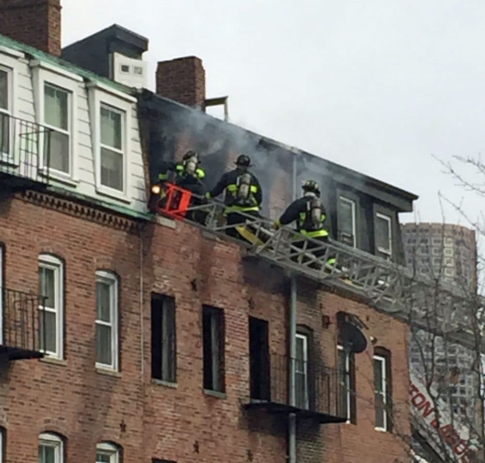 A two-alarm fire caused an estimated $1 million in damage to a vacant apartment building in Boston's North End Tuesday afternoon. (Courtesy Matt Sloan)