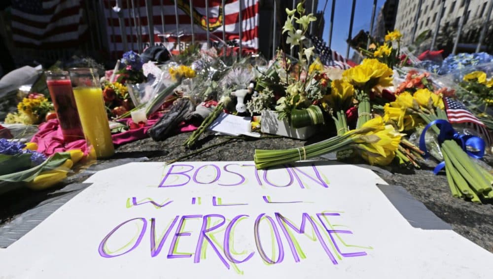 In this photo, a makeshift memorial is seen two days after the bombings. Boston will mark the second anniversary of the 2013 marathon bombings with a subdued remembrance that includes a moment of silence, the pealing of church bells and a call for kindness. (Charles Krupa/AP)