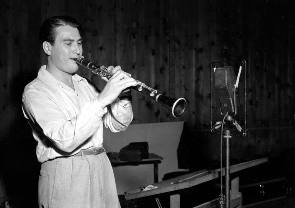 Artie Shaw plays the clarinet on Sept. 10, 1941. The clarinetist and bandleader's recording of &quot;Begin the Beguine&quot; epitomized the Big Band era. (AP)