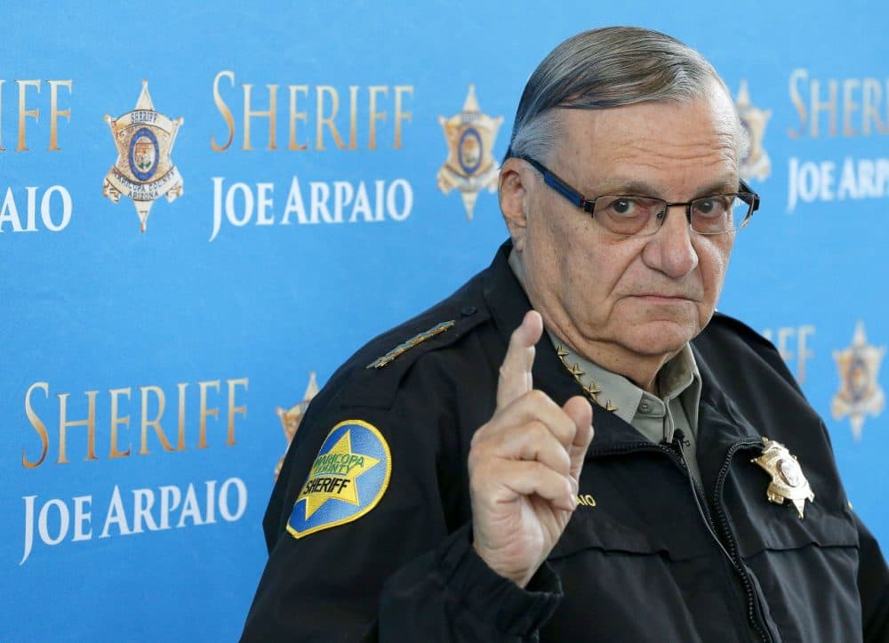 Maricopa County Sheriff Joe Arpaio pauses as he answers a question at a news conference at Maricopa County Sheriff's Office Headquarters in Phoenix, Dec. 18, 2013. (Ross D. Franklin/AP)
