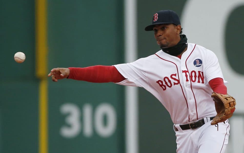 Boston's Xander Bogaerts throws to first base on a ground out by Baltimore's Everth Cabrera during the second inning Monday. (Michael Dwyer/AP)