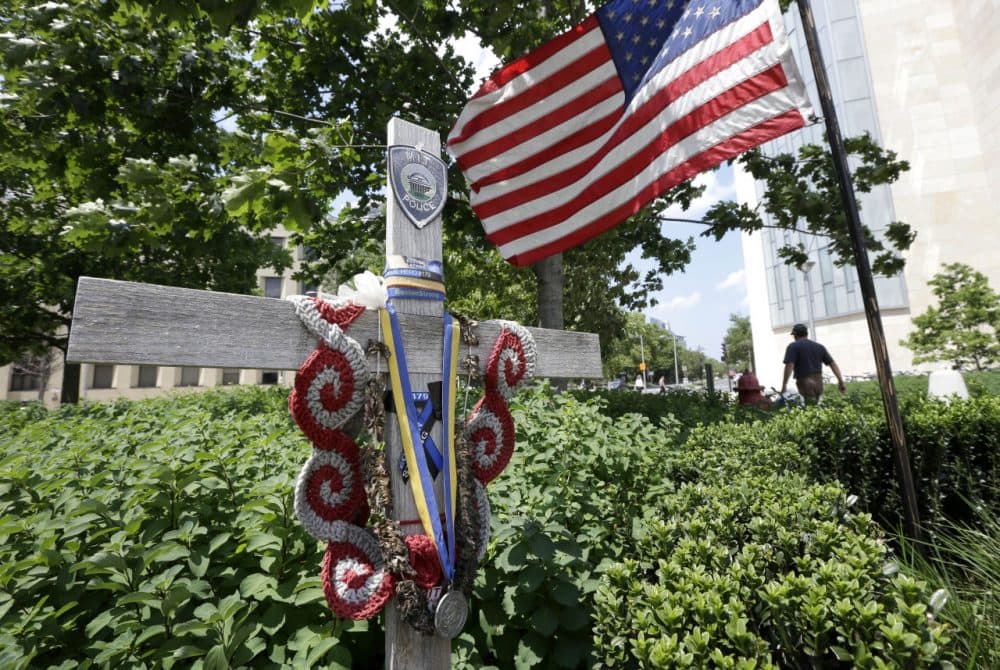 A makeshift memorial to slain Massachusetts Institute of Technology police officer Sean Collier. (AP)