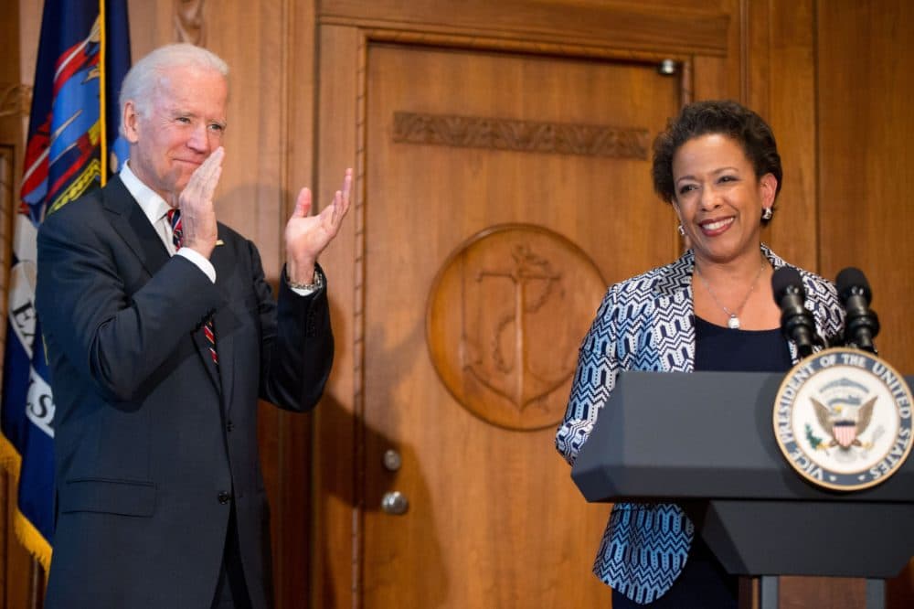 Vice President Joe Biden applauds as Loretta Lynch speaks at the Justice Department in Washington, Monday, after Biden administered the oath of office to Lynch as the 83rd Attorney General of the U.S. (Andrew Harnik/AP)