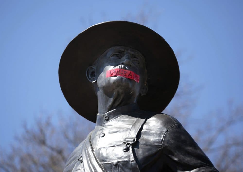 Tape with the word &quot;UNHEARD&quot; covers the mouth of the sculpture &quot;The Sower&quot; at the University of Oklahoma on March 11, 2015 in Norman, Oklahoma. The statue was marked by the black student group OU UNHEARD at the university. (Brett Deering/Getty Images)