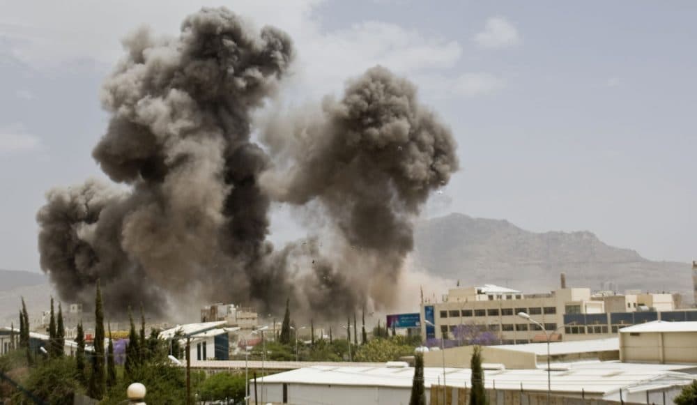Smoke billows from a Saudi-led airstrike on Sanaa, Yemen, Wednesday, April 8, 2015. A state-run broadcaster in Iran is reporting that the Islamic Republic has sent a navy destroyer and another vessel to waters near Yemen amid a Saudi-led airstrike campaign. (Hani Mohammed/AP)