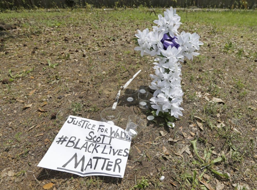 A memorial is placed near the site where Walter Scott was killed in North Charleston, S.C., Wednesday, April 8, 2015. Scott was killed by a North Charleston police officer after a traffic stop on Saturday. The officer, Michael Thomas Slager, has been charged with murder. (AP)