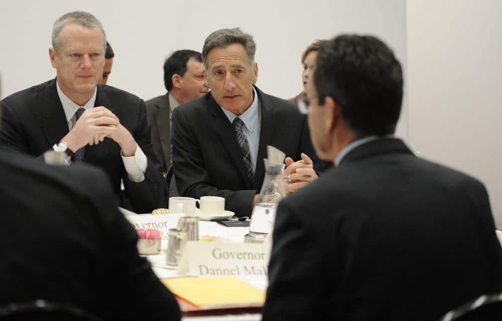 Gov. Charlie Baker, left, sits with Vermont Gov. Peter Shumlin and several other New England governors Thursday during a meeting on energy in Connecticut. (Jessica Hill/AP)