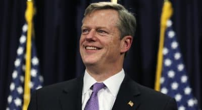 Mary Battenfeld: &quot;Budgets contain more than numbers. They tell the story of who we are and what we care about. Right now, the story features inadequate funding for 200,000 Massachusetts children who live in poverty. &quot; Pictured: Gov. Charlie Baker smiles as he unveils his 2016 budget proposal during a news conference at the State House in Boston, March 4, 2015. (Charles Krupa/AP)