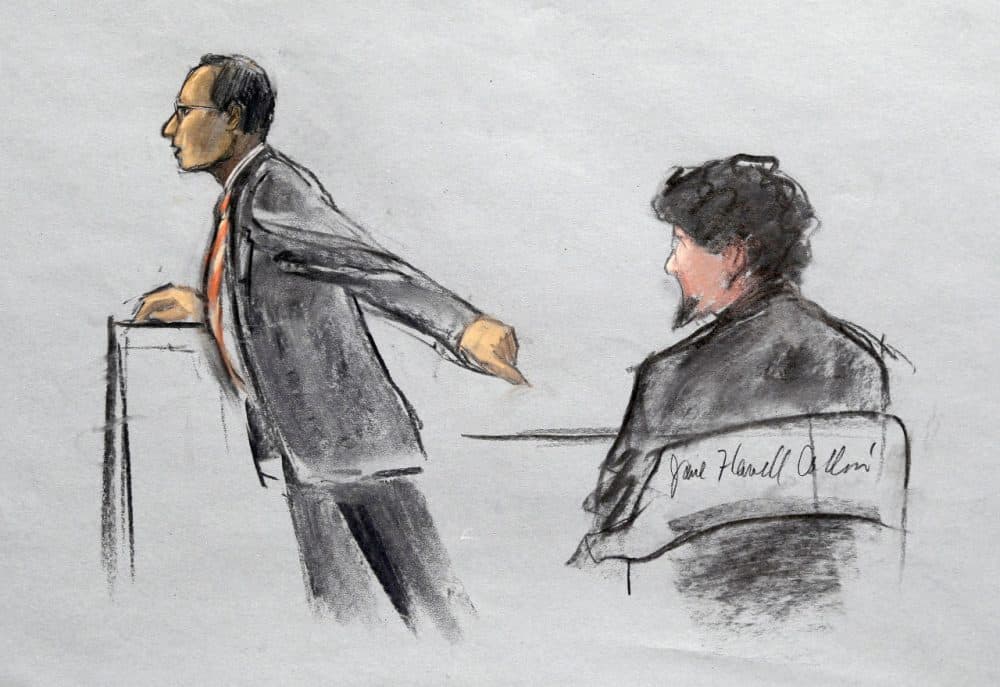 In this courtroom sketch, Assistant U.S. Attorney Aloke Chakravarty points to defendant Dzhokhar Tsarnaev during closing arguments in Tsarnaev's federal death penalty trial Monday, April 6, 2015. (Jane Flavell Collins/AP)