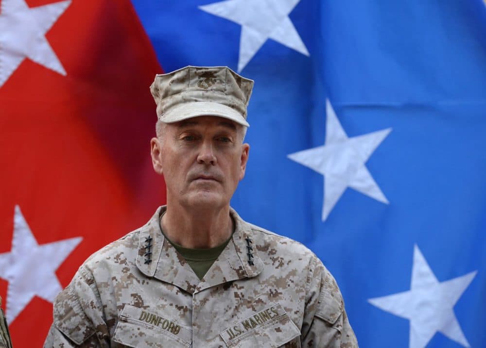 Outgoing International Security Assistance Force (ISAF) commander U.S. General Joseph Dunford attends a change of command ceremony at the ISAF headquarters in Kabul on August 26, 2014. (Shah Marai/AFP/Getty Images)