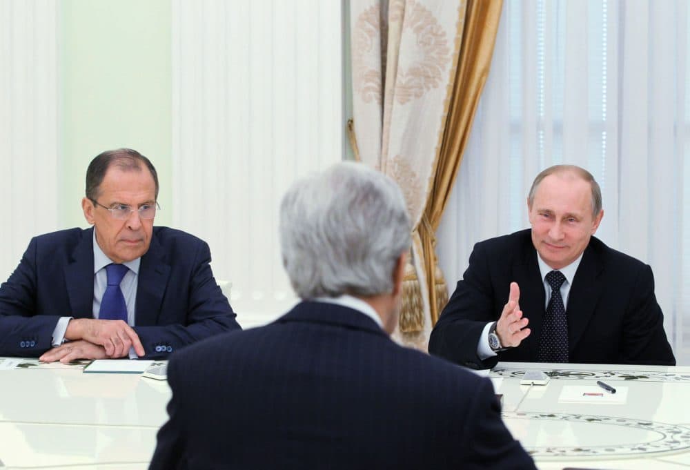 Russia's President Vladimir Putin (right) and Foreign Minister Sergei Lavrov (left) hold talks with U.S. Secretary of State John Kerry (center) in the Kremlin in Moscow, on May 7, 2013. Kerry sought to narrow differences over the conflict in Syria with Putin, urging the Russian strongman to find common ground to help end the bloodshed. (Mikhail Klimentyev/AFP/Getty Images)