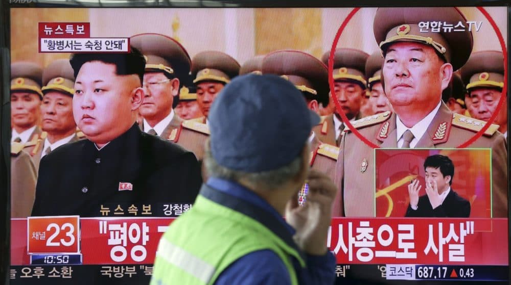 A man watches a TV news program reporting that People's Armed Forces Minister Hyon Yong Chol was killed by anti-aircraft gunfire, at Seoul Railway Station in Seoul, South Korea, Wednesday, May 13, 2015. North Korean leader Kim Jong Un executed his defense chief for sleeping during a meeting and talking back to the young leader, South Korea's spy agency told lawmakers Wednesday, citing what it called credible information. The part of letters on the bottom &quot;Pyongyang, executed by anti-aircraft gunfire.&quot; (Lee Jin-man/AP)