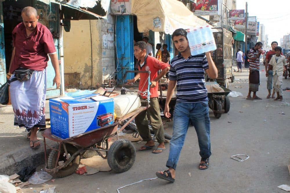 Yemenis purchase goods in the Sheikh Othman area, in the southern Yemeni port city of Aden, on May 13, 2015. King Salman doubled Saudi Arabia's Yemen aid commitment to $540 million, the first day of a humanitarian pause in a bombing campaign it has led against neighboring rebels. (Saleh Al-Obeidi/AFP/Getty Images)