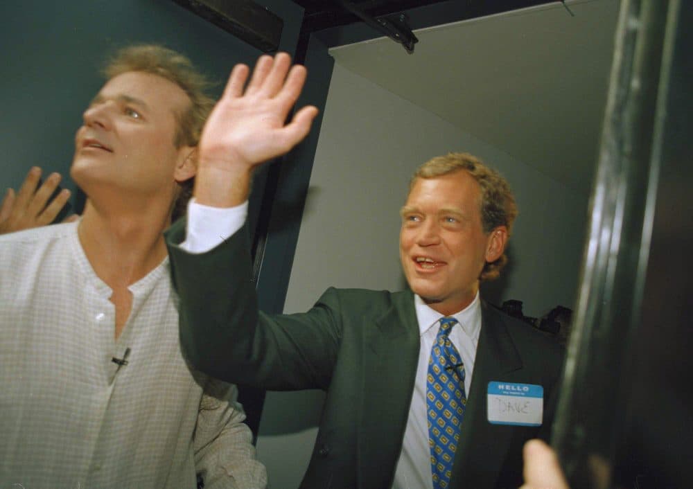 In this Aug. 30, 1993 file photo, David Letterman, right, and Bill Murray wave from the side door of the Ed Sullivan Theater during the first episode of &quot;Late Show with David Letterman&quot; in New York. After 33 years in late night and 22 years hosting CBS' &quot;Late Show,&quot; Letterman will retire on May 20. (Jim Cooper/AP)