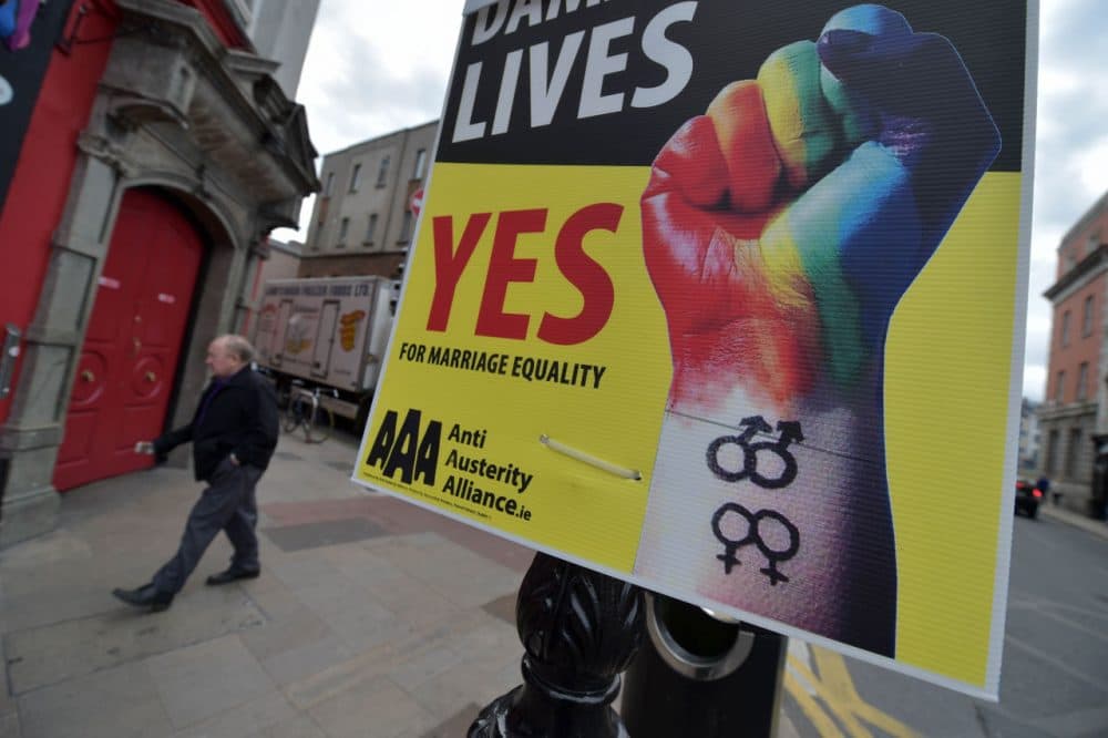 A man walks past billboard posters promoting the Yes campaign in favor of same-sex marriage on May 22, 2015 in Dublin, Ireland. Voters in the Republic of Ireland are taking part in a referendum on legalizing same-sex marriage on Friday. The referendum is being held 22 years after Ireland decriminalized homosexuality with more than 3.2 million people being asked whether they want to amend the country's constitution to allow gay and lesbian couples to marry. (Charles McQuillan/Getty Images)
