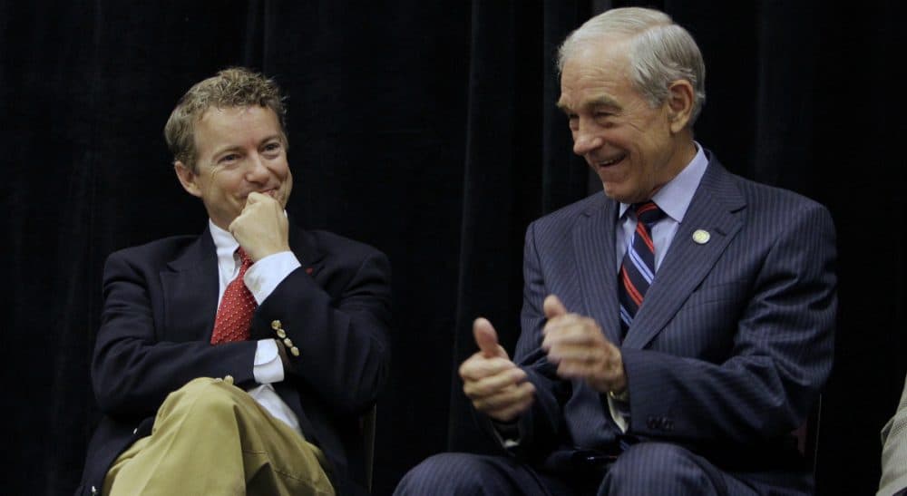 The political philosophy is great for back-benching, but not for governing, says Rich Barlow. Pictured: Rand Paul, left, with his father, Ron Paul, Saturday, Oct. 2, 2010.  (Ed Reinke/AP)