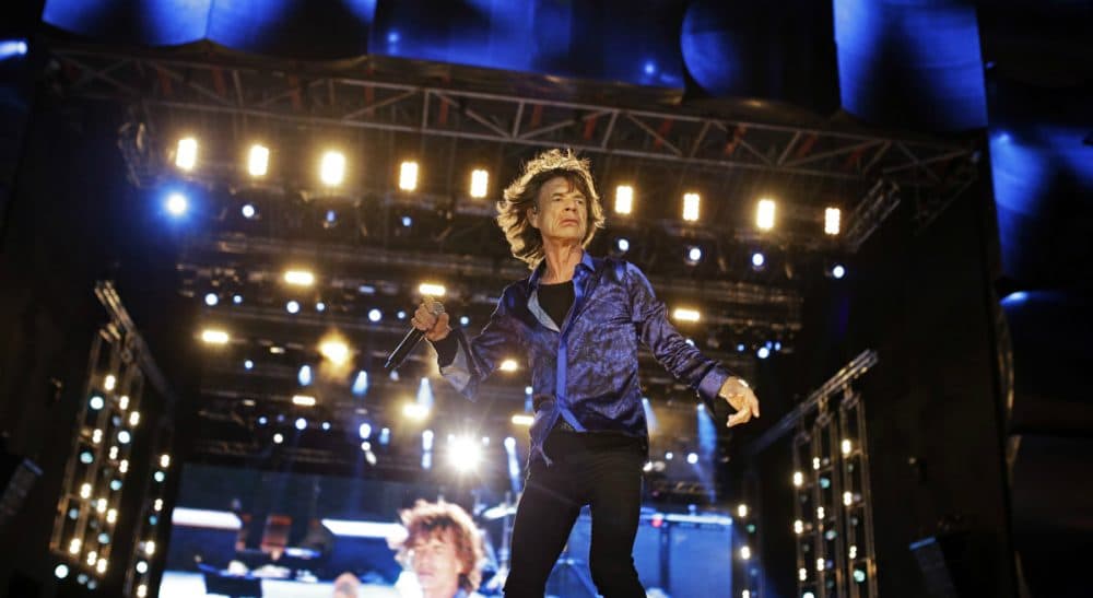 Should we follow the musical heroes of our youth into that good night, or feel out of place at a Mumford &amp; Sons concert instead? In this May 29, 2014 photo, Mick Jagger performs in Lisbon. (Francisco Seco/AP)
