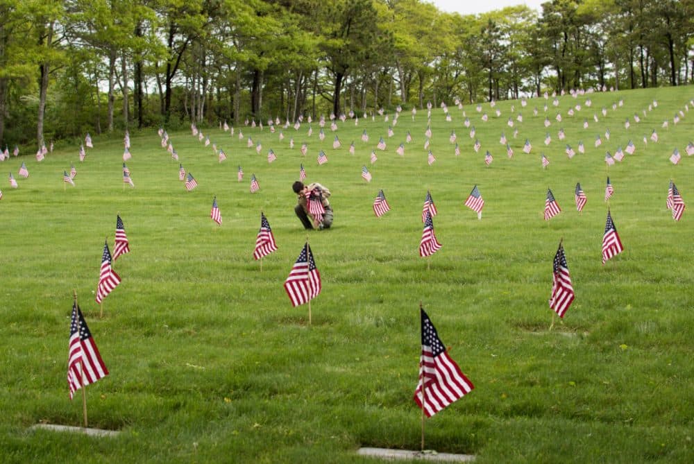 American flags mark the graves of veterans at Massachusetts National Cemetery during a past Operation Flags for Vets. (Casey Ashlock)