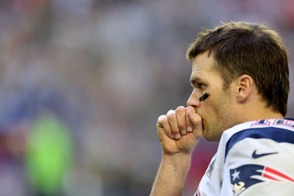 Patriots quarterback Tom Brady is appealing the four-game suspension he received from the NFL for his alleged role in the use of deflated footballs during the AFC championship game. (Gregory Payan/AP)