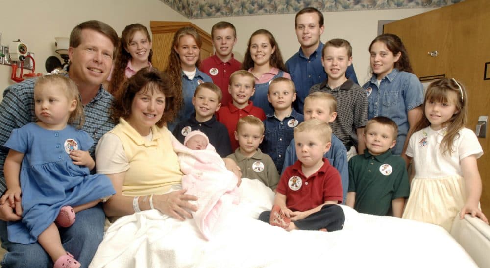 In this photo, the Duggar family, stars of the hit reality TV show &quot;19 Kids and Counting,&quot; is pictured after the birth of their 17th child, 2007. Last week, the Duggar's eldest son Josh confirmed reports that, as a teenager, he molested several underage girls, including his sisters. (Beth Hall/AP)