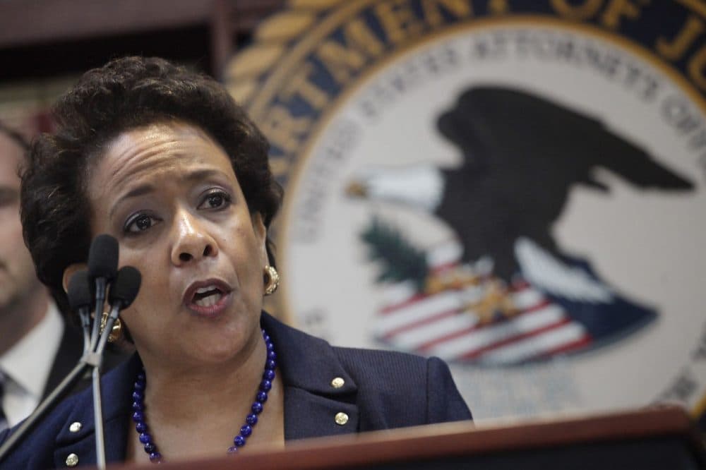 U.S. Attorney General Loretta Lynch announces an indictment against nine FIFA officials and five corporate executives for racketeering, conspiracy and corruption Wednesday. (Mark Lennihan/AP)