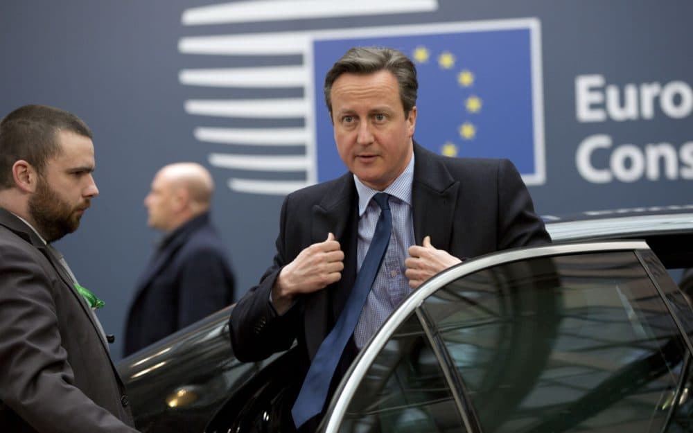 British Prime Minister David Cameron, center, arrives for an EU summit in Brussels on Thursday, March 19, 2015.  (Virginia Mayo/AP)