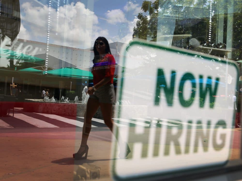 A &quot;now hiring'' sign is seen in a storefront window on July 5, 2012 in Miami Beach, Florida. (Joe Raedle/Getty Images)