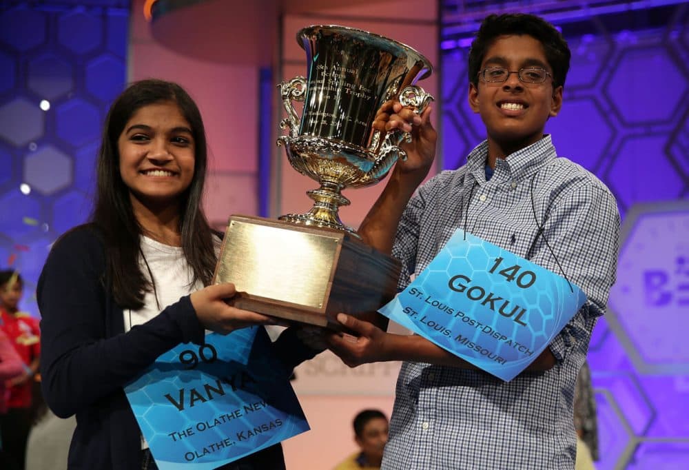 Vanya Shivashankar  (left) of Olathe, Kansas, and Gokul Venkatachalam (right) of St. Louis, Missouri, hold up the trophy after winning the 2015 Scripps National Spelling Bee May 28, 2015 in National Harbor, Maryland. Shivashankar and Venkatachalam were declared co-champions at the annual spelling competition. (Alex Wong/Getty Images)