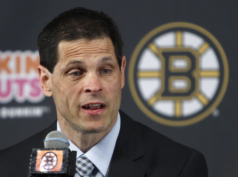Don Sweeney speaks in Boston Wednesday after being elevated to general manager for the Bruins, taking over for his former boss, Peter Chiarelli, who was fired in April after the team missed the playoffs for the first time in eight years. (Bill Sikes/AP)