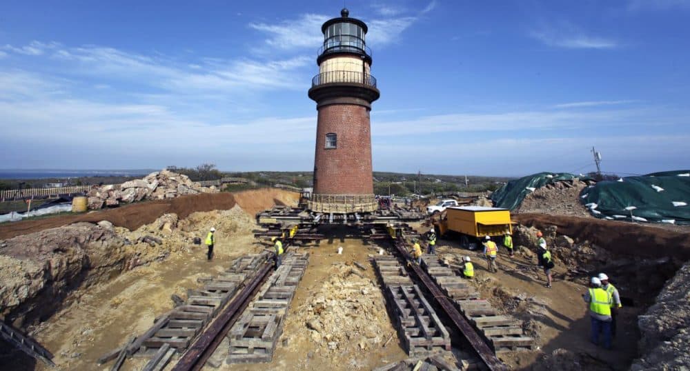 Workers moving the Gay Head Lighthouse, which settled into its new location Saturday, May 30, 2015. (Charles Krupa/AP)