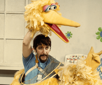 Archival photo of Caroll Spinney puppeteering Big Bird. (Courtesy Robert Furhing)
