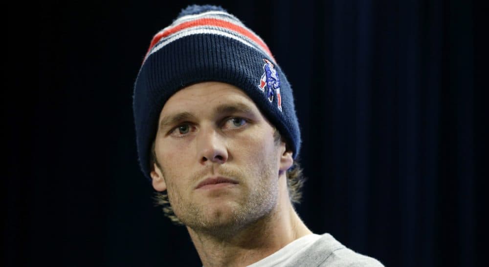 Peter May: &quot;[Cheating scandals in football] are a big deal to a lot of people, but, in a Patriots Nation teeming with Brady-ophiles, they are mere spitballs against the battleship. And so is this.&quot; Pictured: New England Patriots quarterback Tom Brady speaks at a news conference in Foxborough, Mass., Thursday, Jan. 22, 2015 as he addresses the issue of the NFL investigation of deflated footballs. (Elise Amendola/AP)