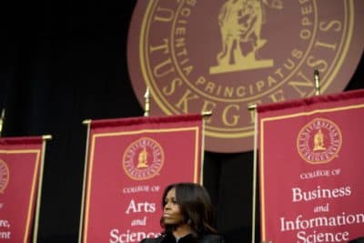 First lady Michelle Obama listens before she delivers the commencement address at Tuskegee University, Saturday, May 9, 2015, in Tuskegee, Ala.  (AP)