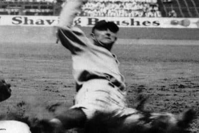In this file photo, Detroit Tigers outfielder, Ty Cobb, slides into base in 1925. (AP)
